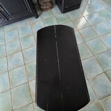 Oval gateleg table from the late 19th century, repainted in black.