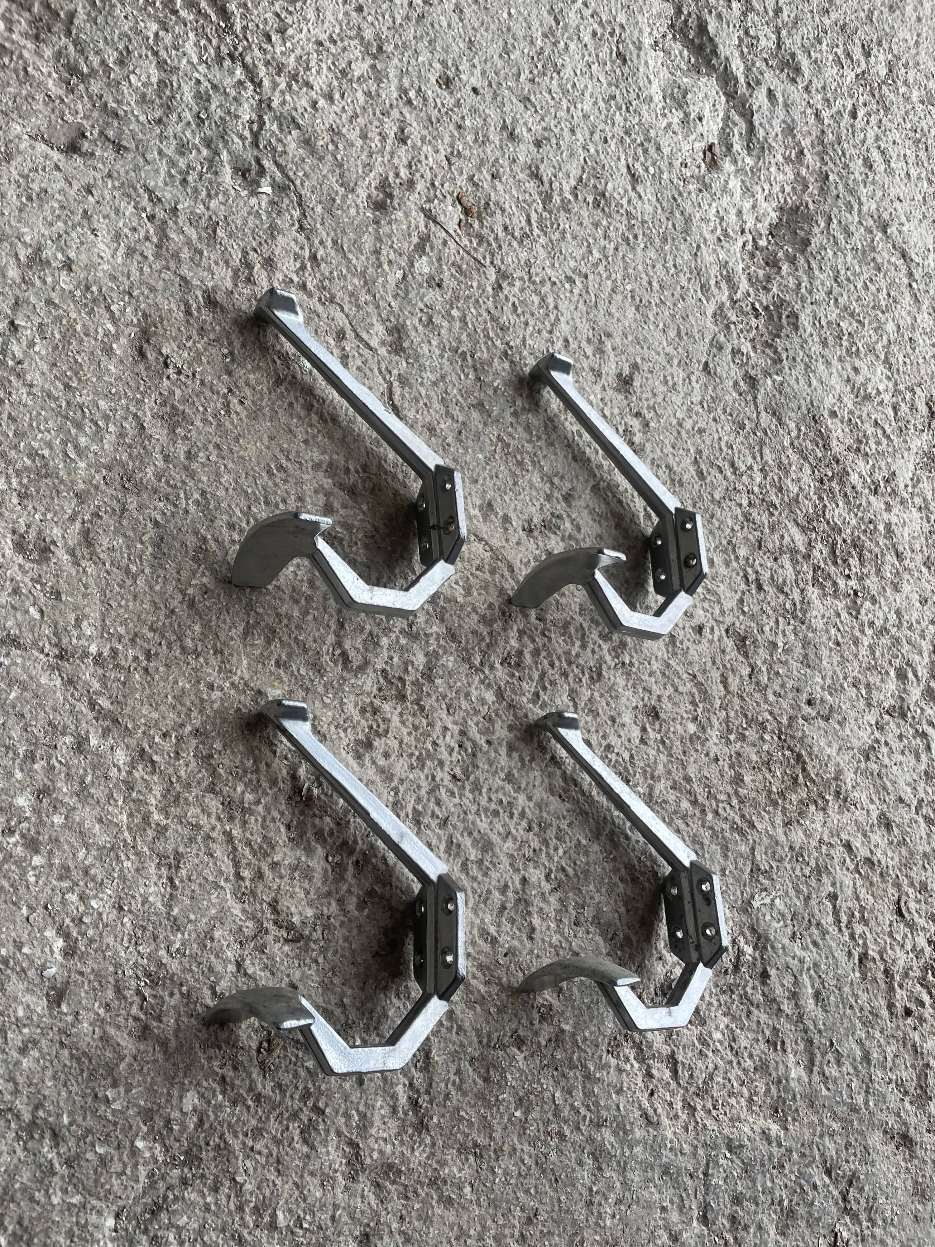 Set of 4 old metal coat hooks