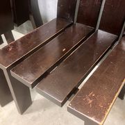 Brutalist and modernist dining chairs from the 1970s in architectural brown wood.