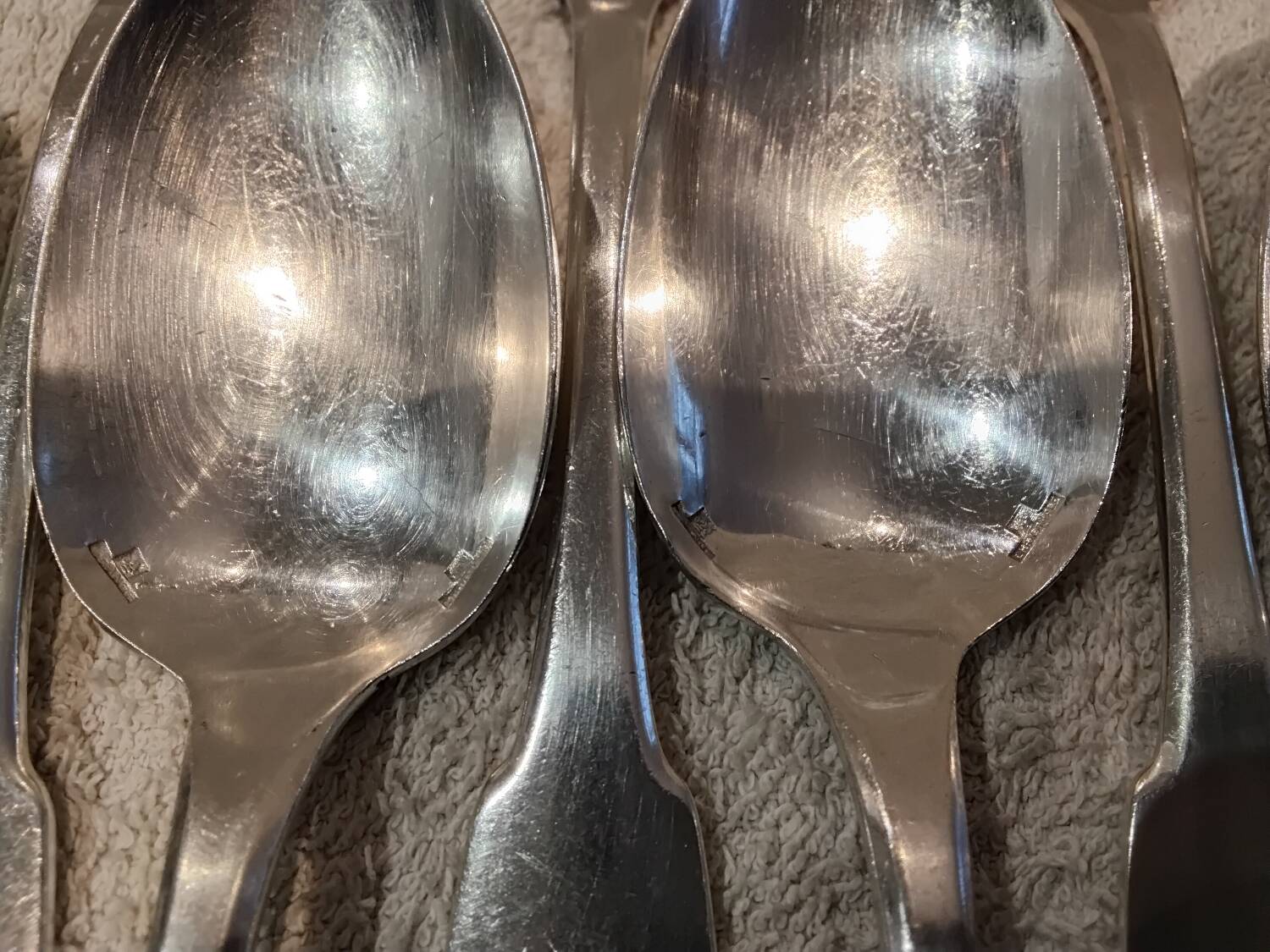 11 silver-plated dessert spoons by Christofle, Cluny pattern, striped