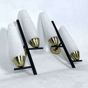 Mid-Century pair of double lights sconces in brass and opaline glass. Italy 1950s