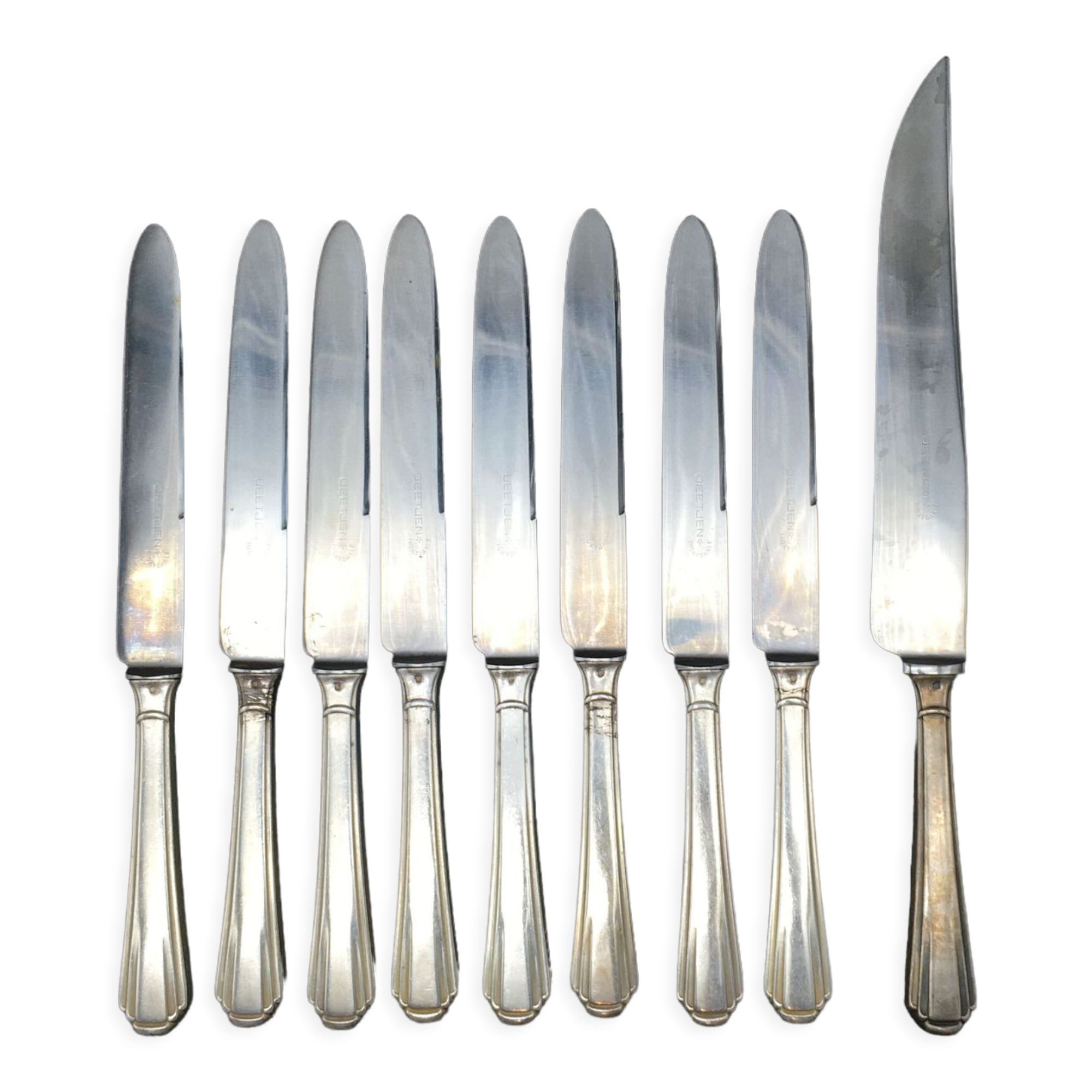 8 knives and 1 serving knife in silver metal Deetjen