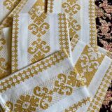Set of 11 ocher napkins