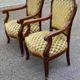 2 Louis XV cabriolet armchairs in wood and embroidered golden fabric.
