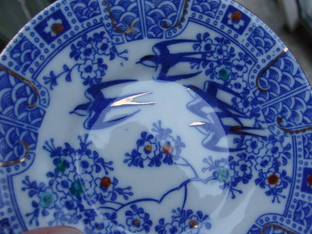 Asian Swallow Cup and Saucer