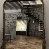 Large gilded mirror with pediment
