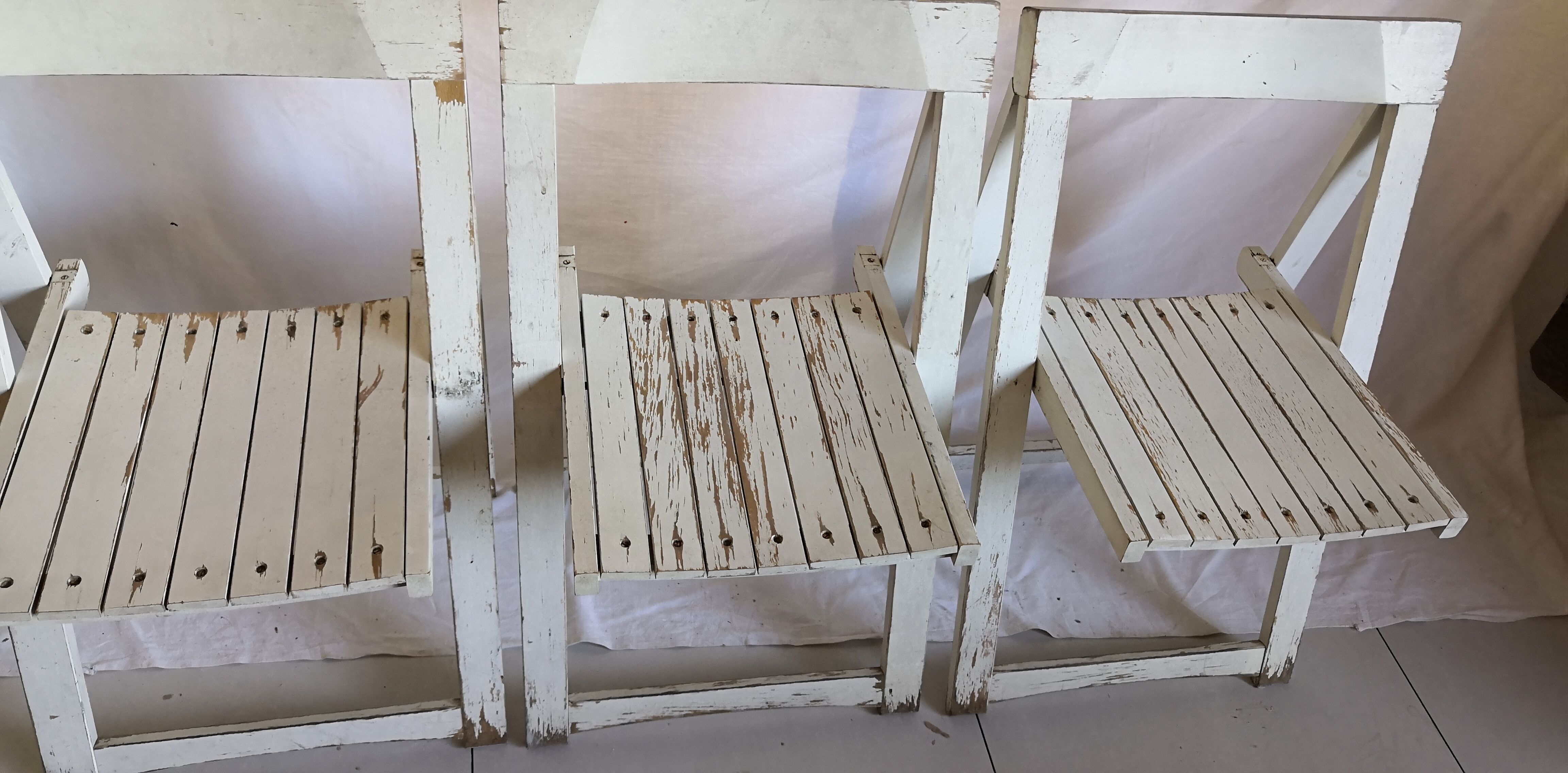Trio of vintage folding chairs 60s
