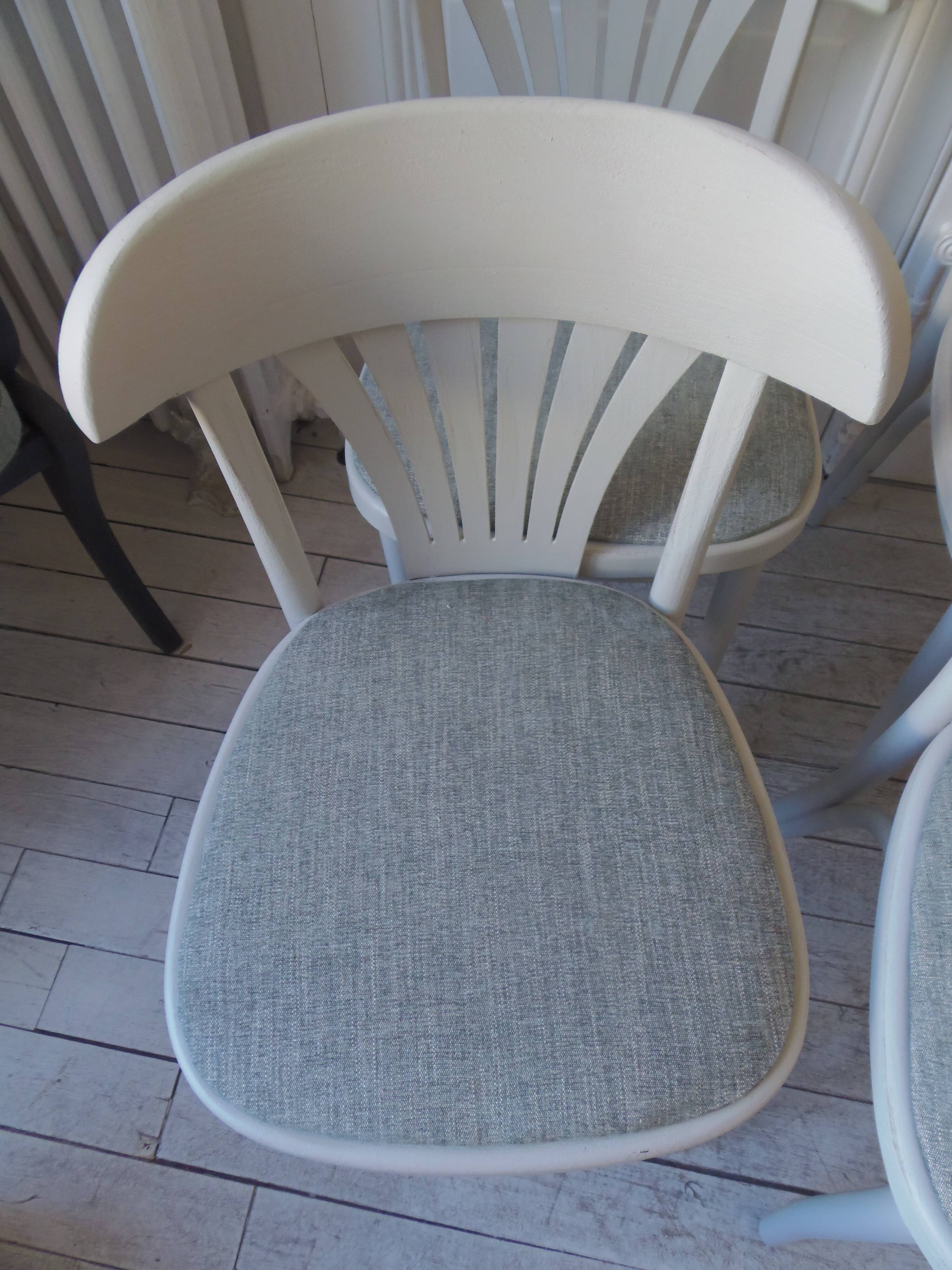 Set of 4 vintage bistro chairs enhanced in pearl grey.