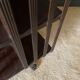 Bibliotheque tournante en acajou anglaise XXe pieds griffes cuir vert