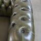 Magnifique fauteuil club en cuir de vachette verte de style anglais.