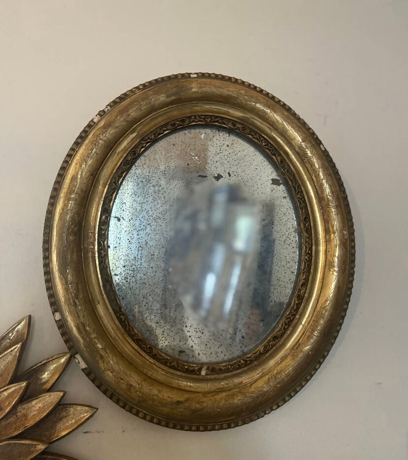 Mirror in gilded stucco nineteenth century