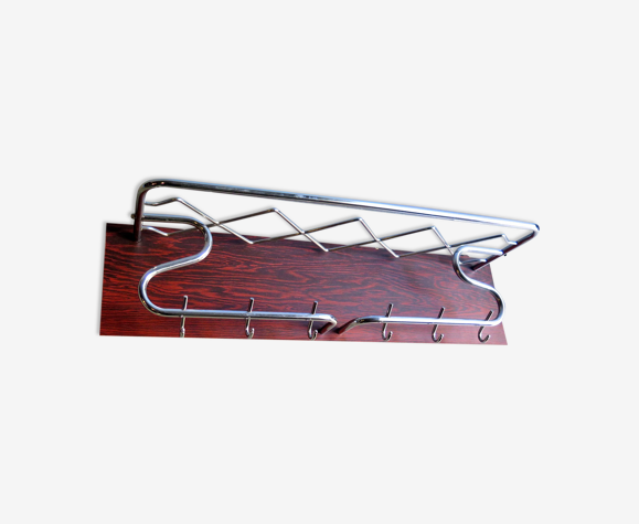 Chrome metal in a rosewood veneer board coat rack