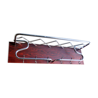 Chrome metal in a rosewood veneer board coat rack