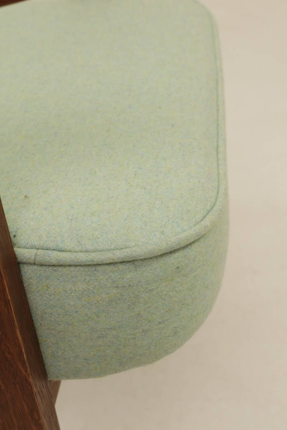 Mid-century modern armchair, oak wood, natural wool.
