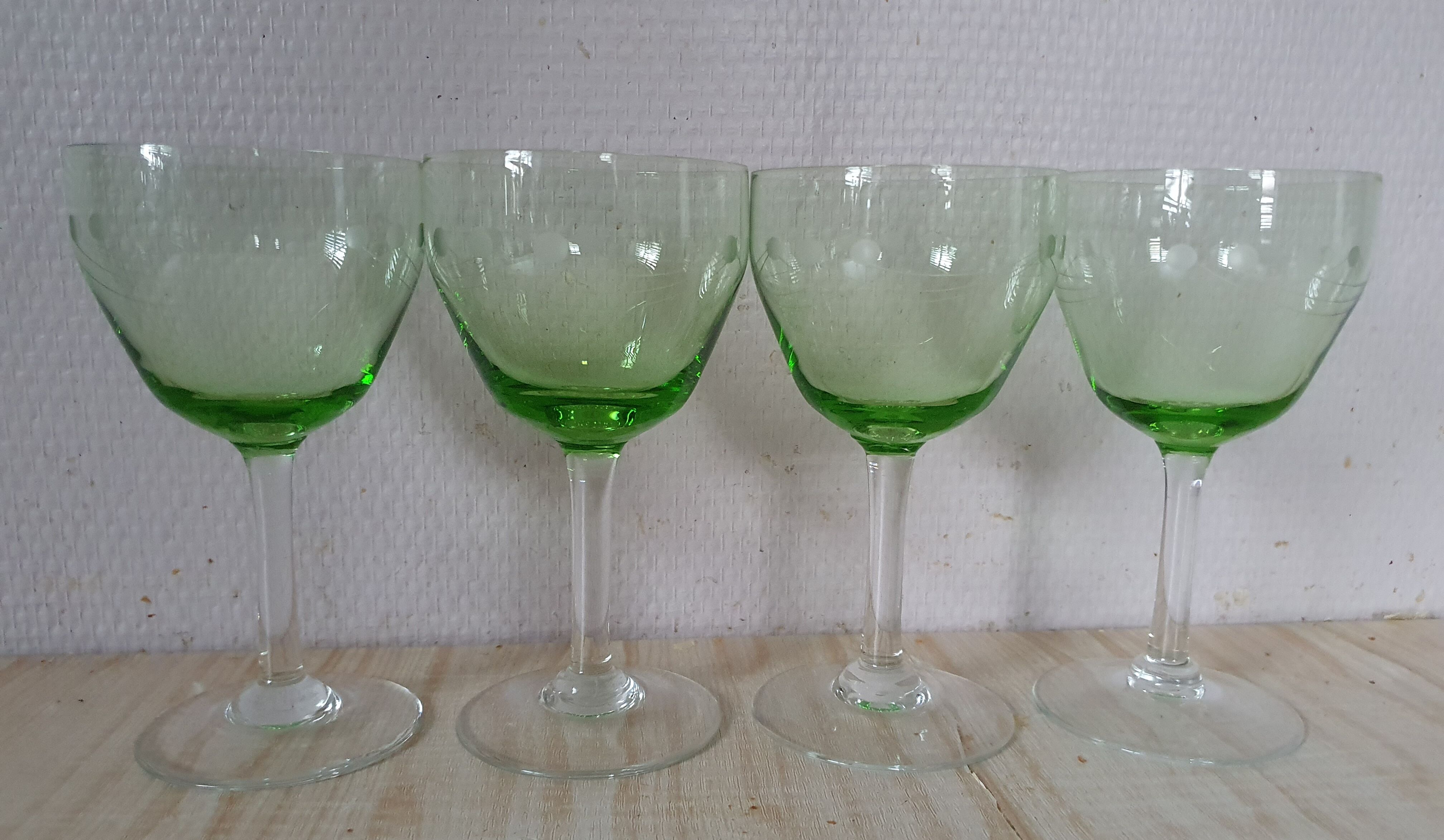 4 glasses of ouraline crystal wine