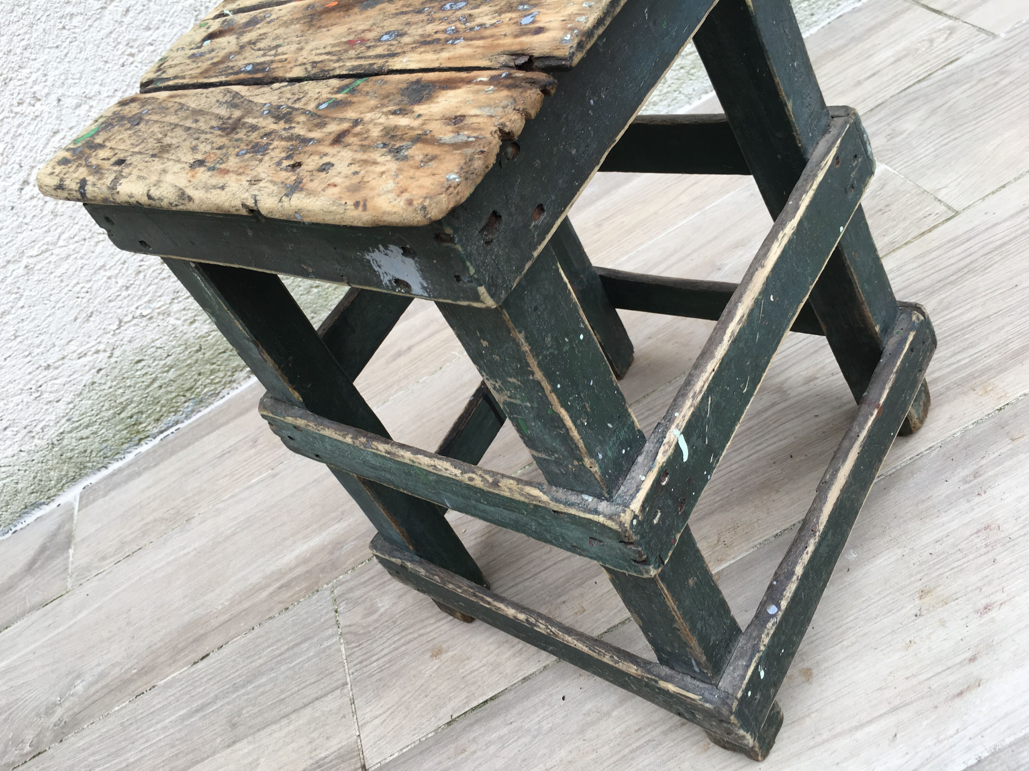 Former green workshop stool