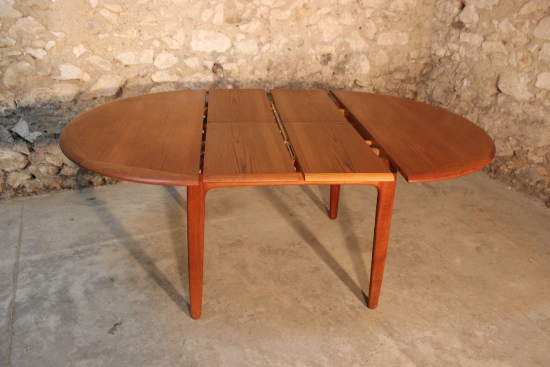 Scandinavian vintage teak dining table with 2 extension cords hidden by Svend Aage Madsen for Knudsen - Son, Denmark