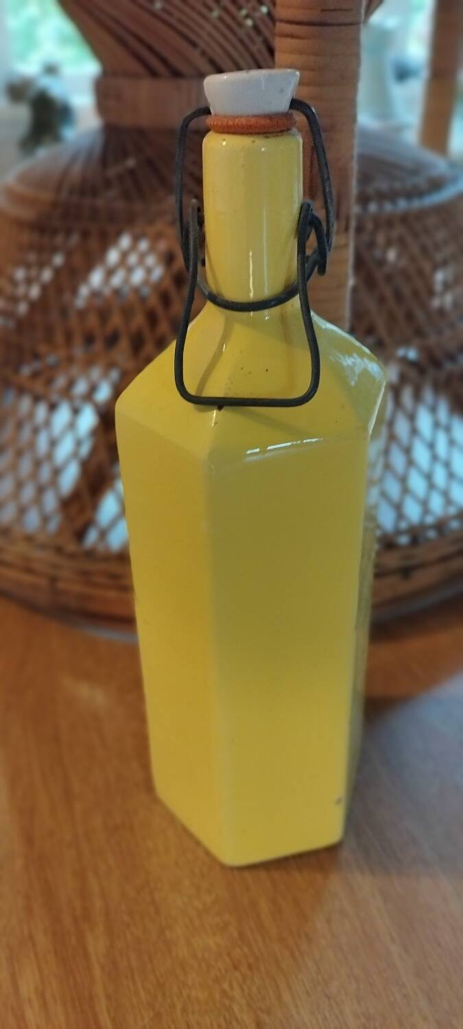 Glazed yellow stoneware bottle, 20th century.