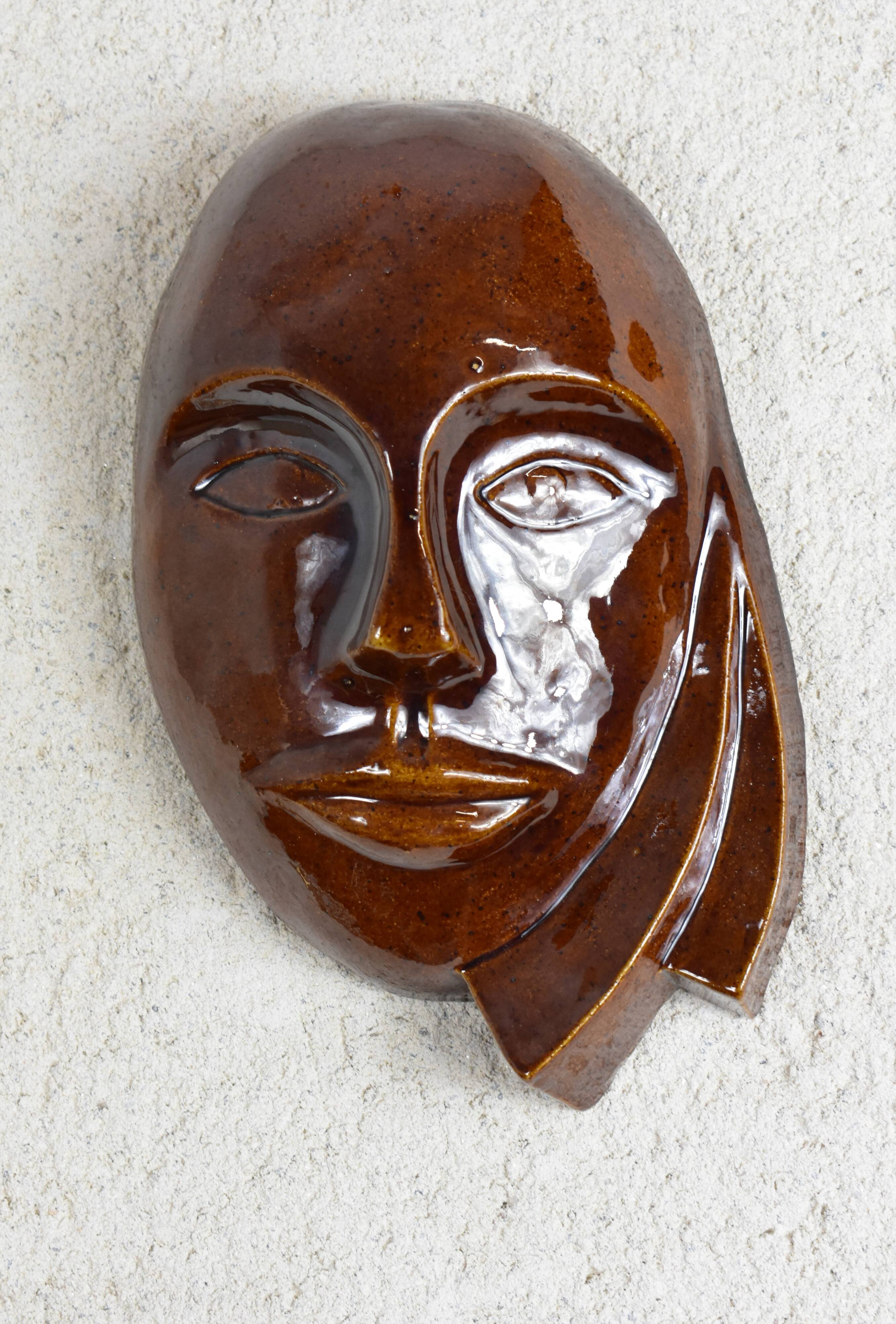 Signed brown enamel mask
