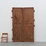 Large 17th century Monastery doors in terracotta lacquered oak, Portugal