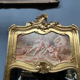 Antique rococo mirror with cupids