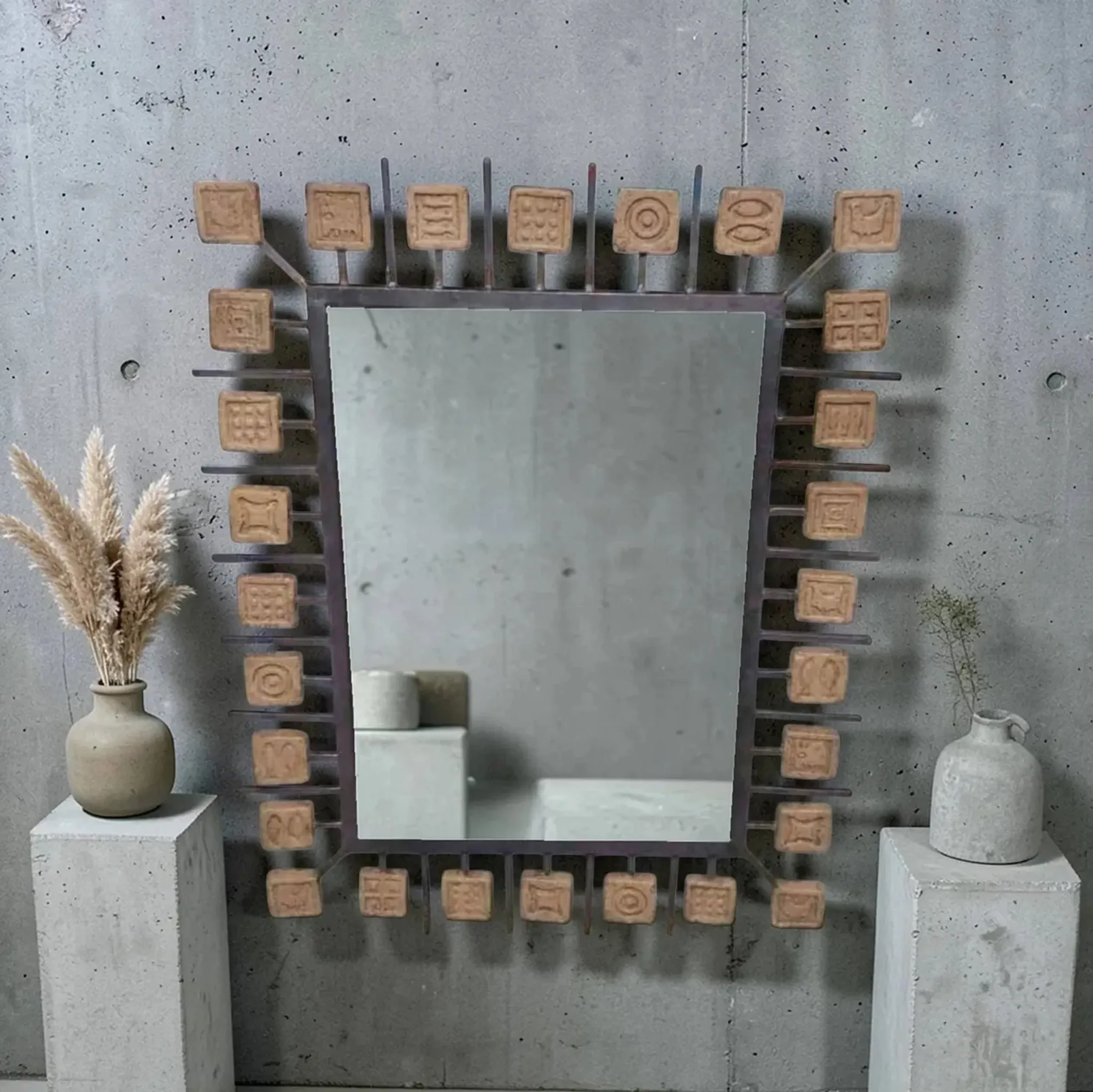Rectangular brutalist mirror in wrought iron and terracotta tiles.