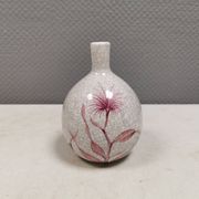 A vase in crackled porcelain with pink decoration. Germany 1930s