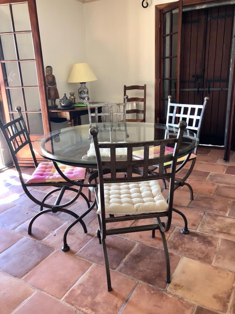 Wrought iron and glass table 4 chairs