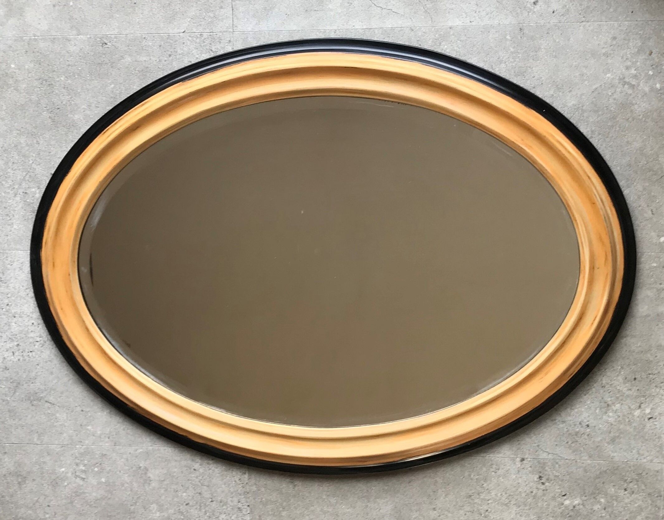Oval mirror in wood and beveled ice - 88 cm by 63 cm