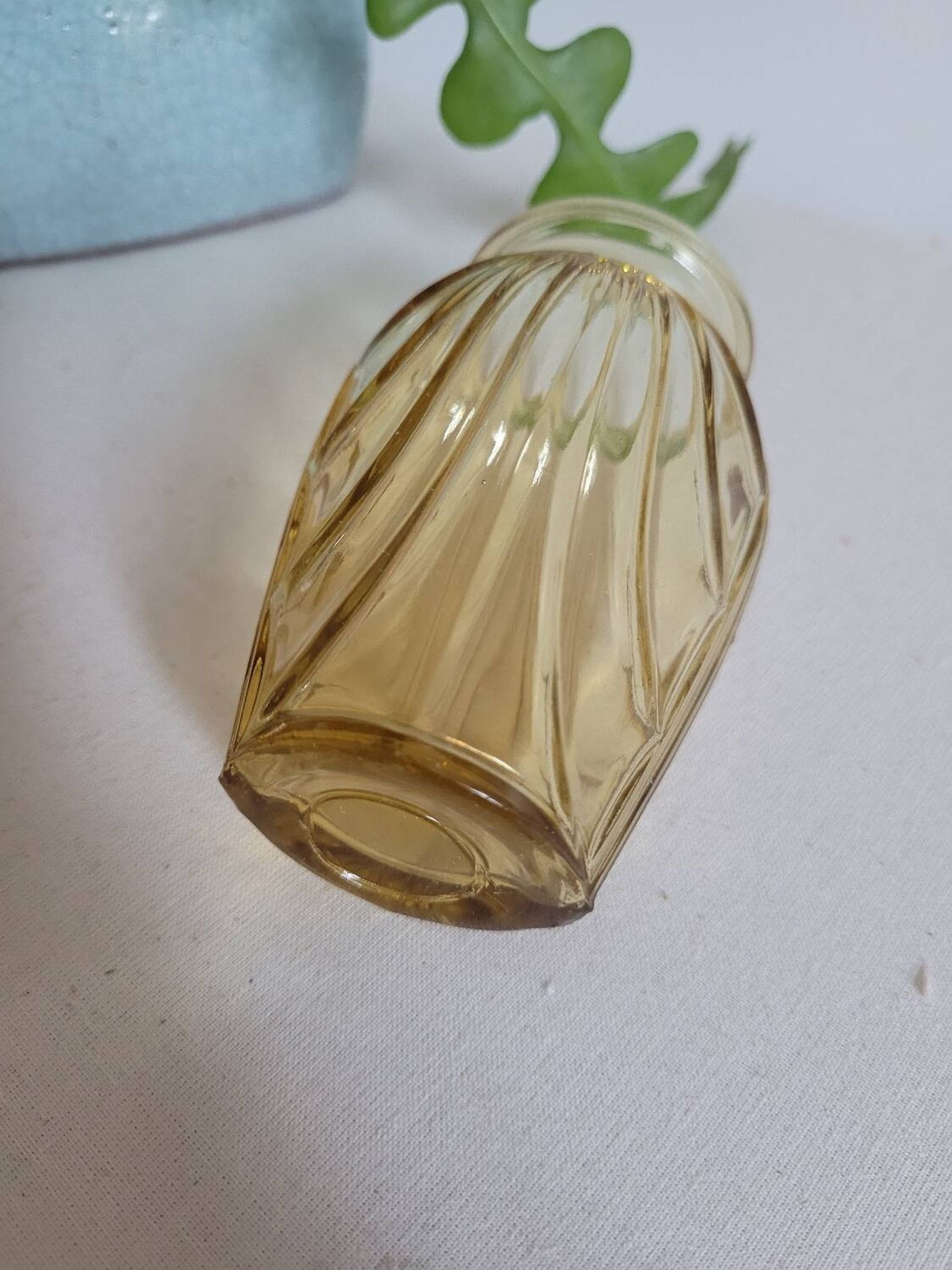 Small yellow draped bulb vase