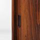 Low sideboard in rosewood with sliding doors. Denmark, 1960s