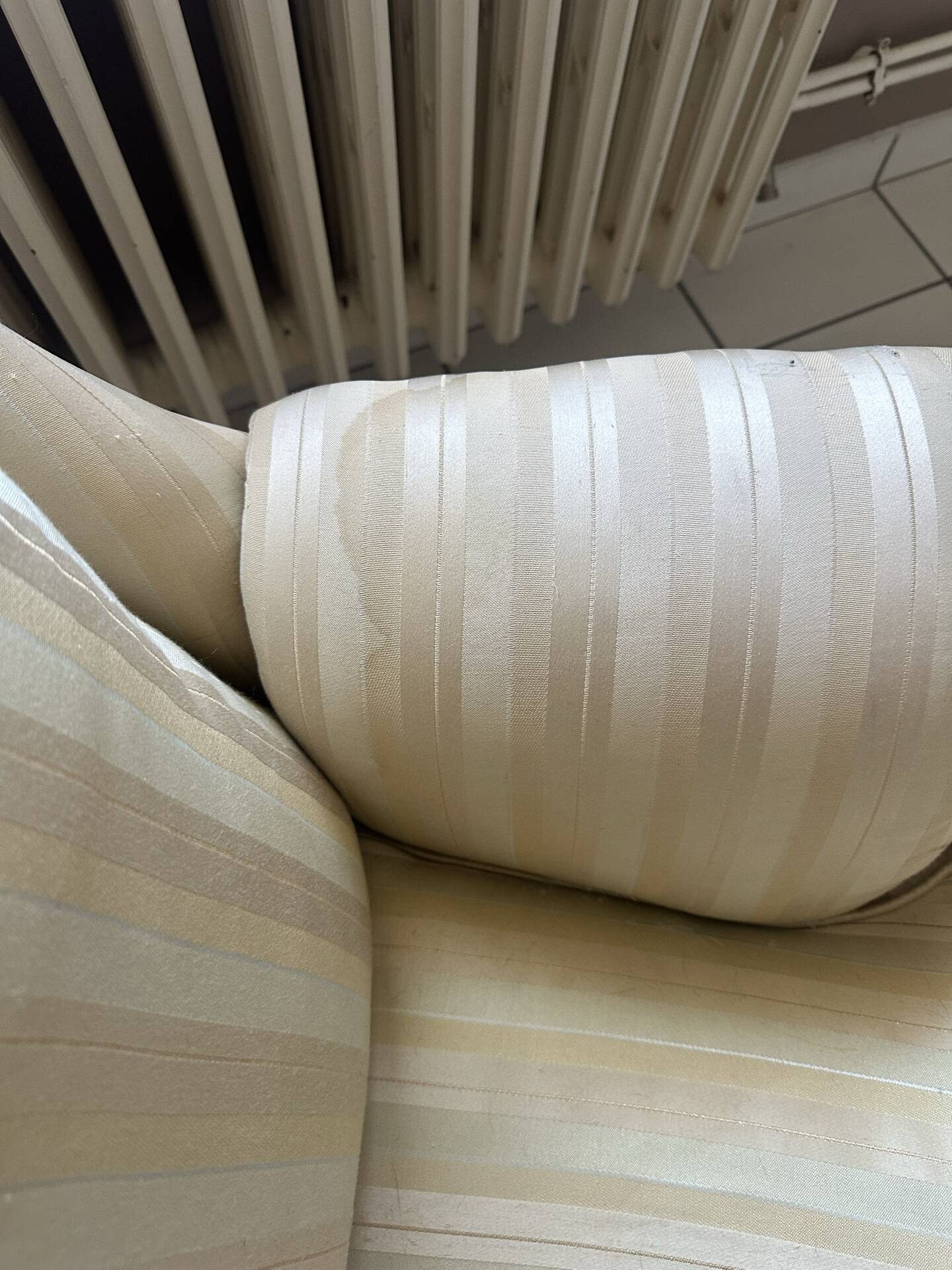 Pair of vintage bergère armchairs in striped ecru and beige fabric.
