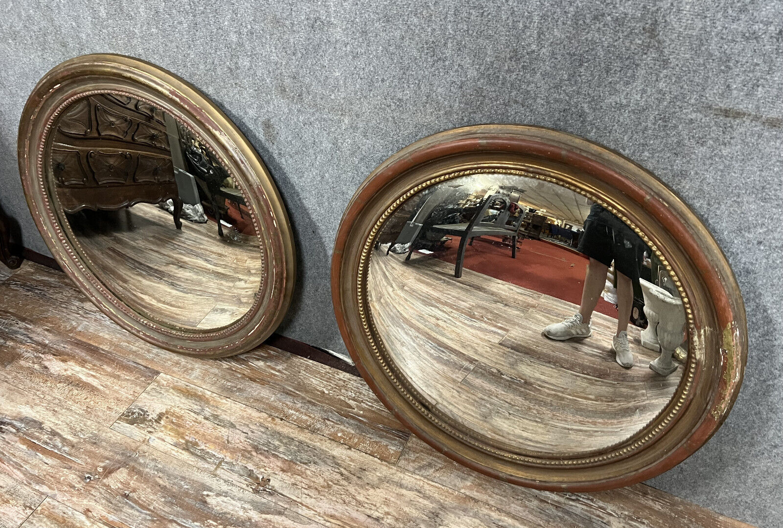 Pair of mirrors called "witch's eye" with patinated golden frame style Napoleon III
