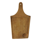 Wood cutting board with groove and handle