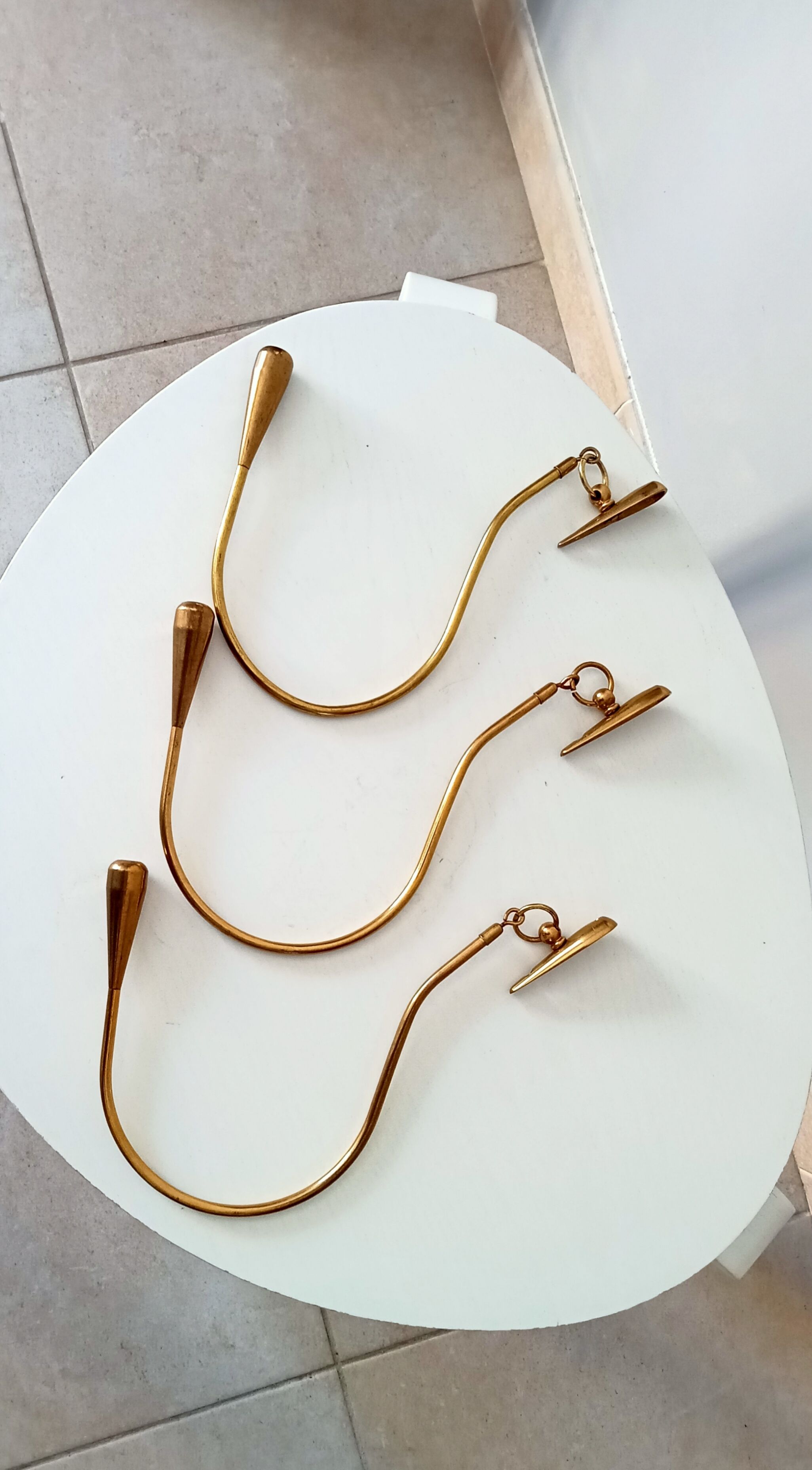 Vintage patère in solid golden brass