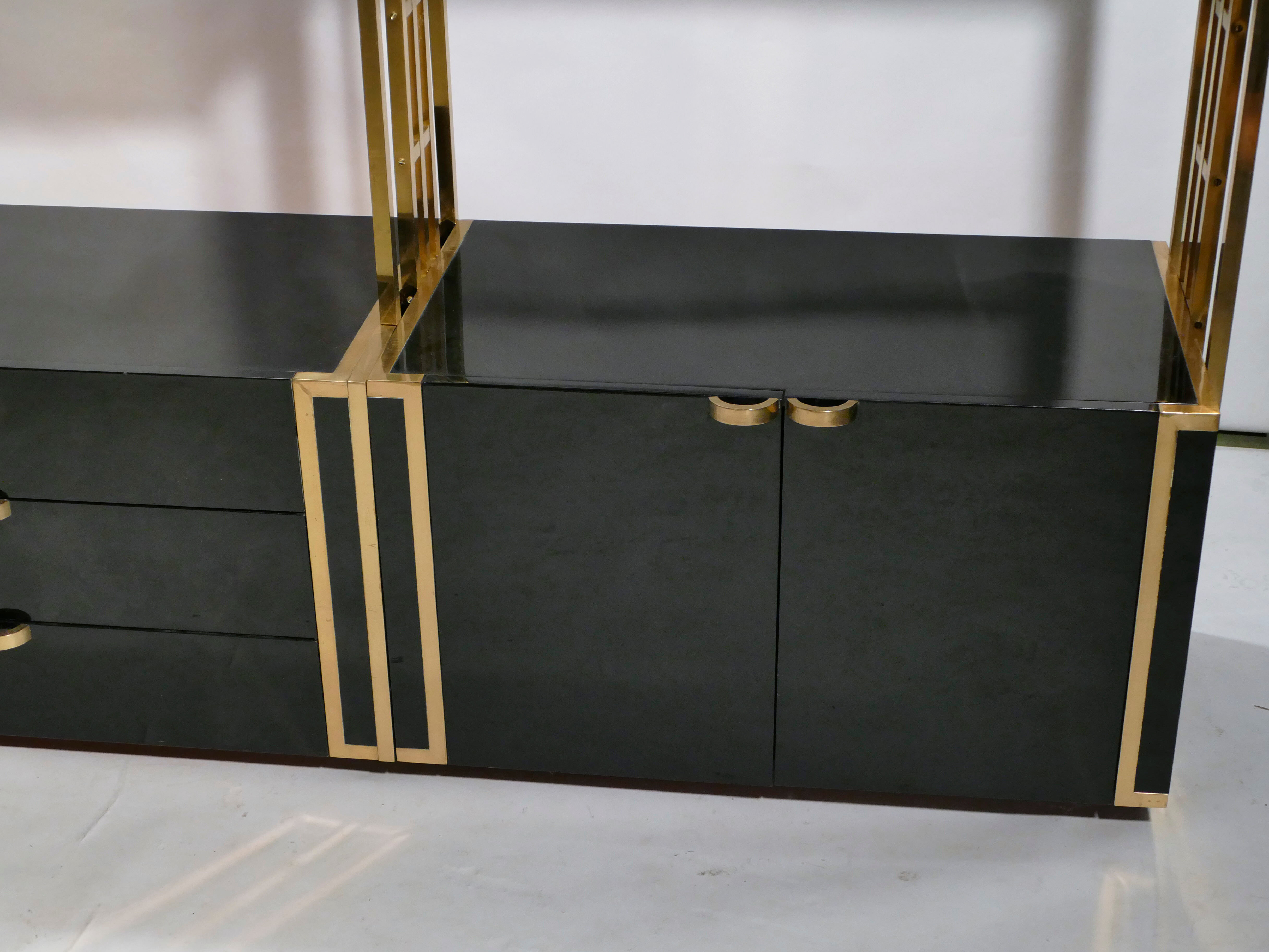 Brass laced library shelf by Kim Moltzer 1970
