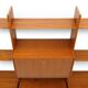 Library with wooden uprights by A.V. Contemporary Furnishings, 1960s.
