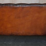 Victorian Chesterfield leather canapé with oak lion claw feet.