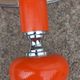Designer lamp from the 70s in chrome metal and orange lacquered wood