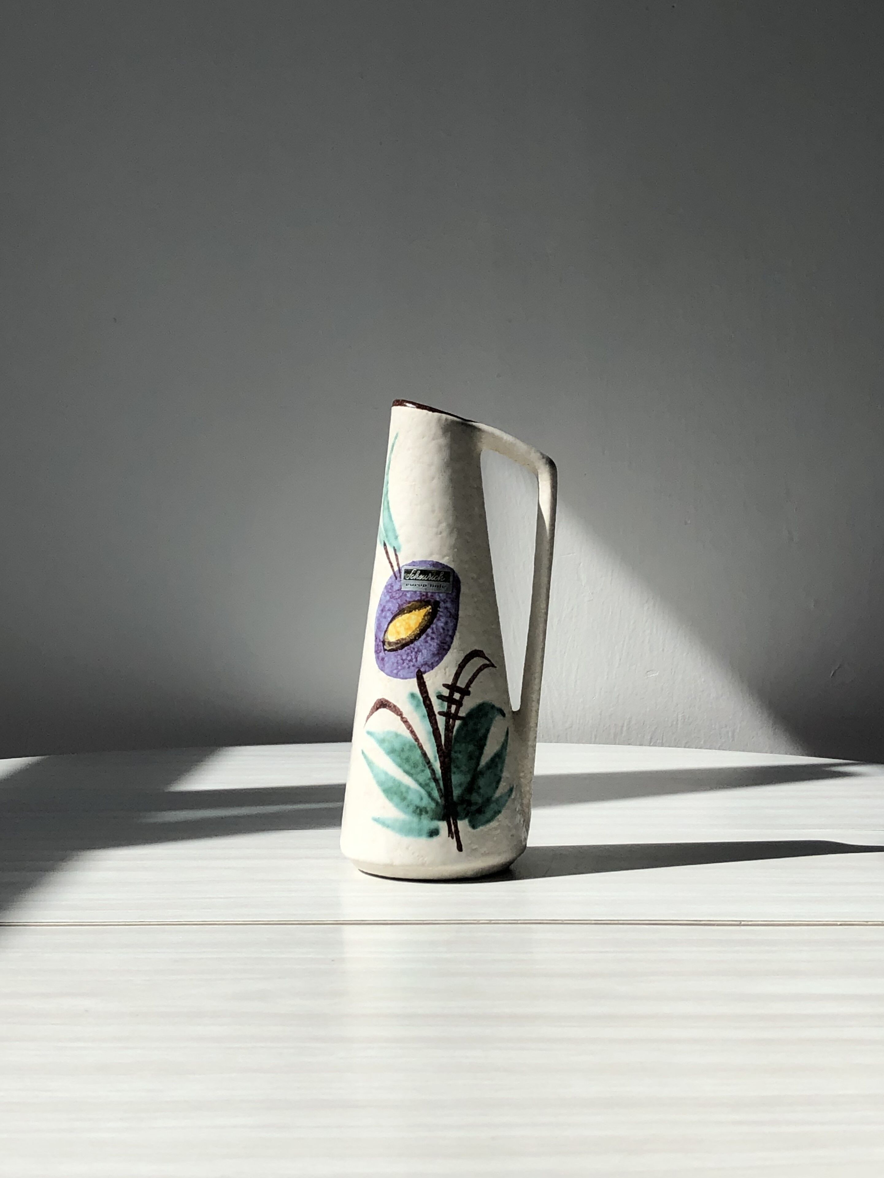 Very decorative colorful pitcher vase with Scheurich floral motif