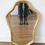 Golden mirror in wood and gold leaf