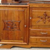 Solid walnut sideboard, moustache legs, black marble top.