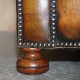 Restored leather Chesterfield sofa, walnut legs.