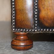 Restored leather Chesterfield sofa, walnut legs.