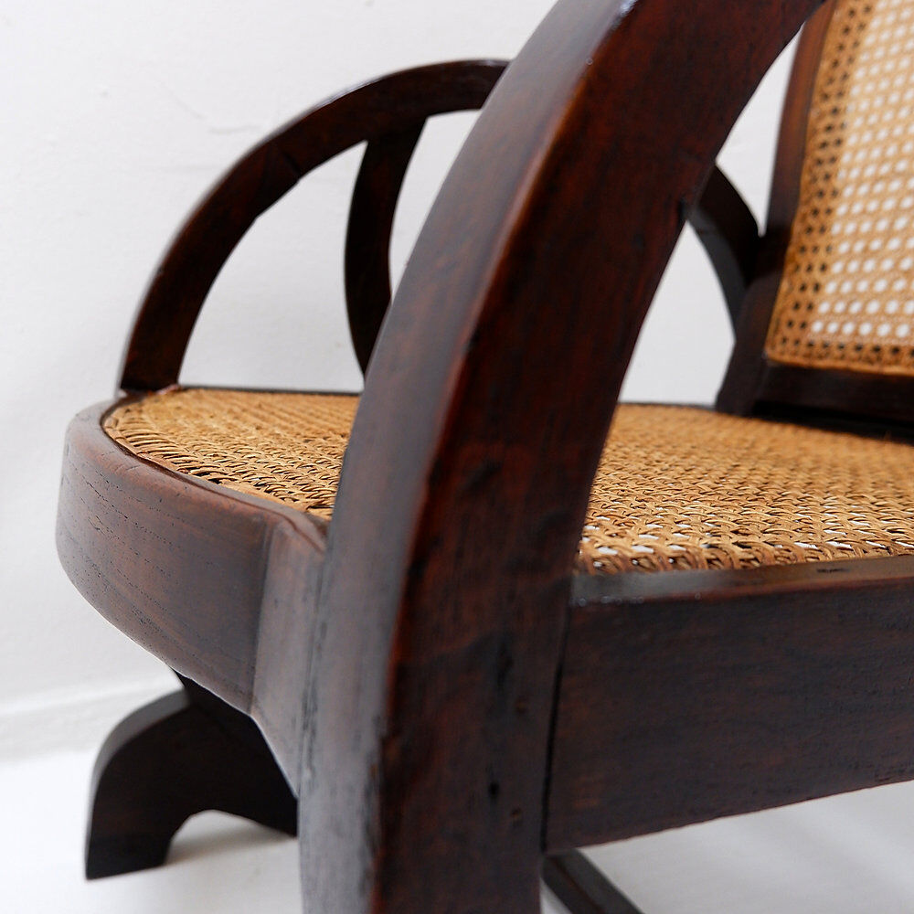 Art Deco armchairs in wood, with cane seat and backrest, circa 1930.