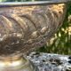 Large silver plated champagne cooler bowl on pedestal with grape