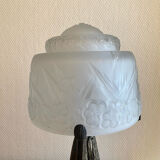 Art Deco lamp signed by Müller Frères in wrought iron and moulded glass.