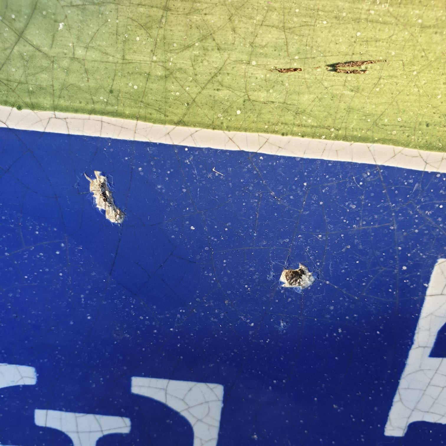 old enamelled street plaque