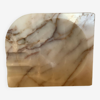 Asymmetrical marble ashtray pocket