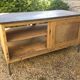 Antique workshop cabinet with sliding doors